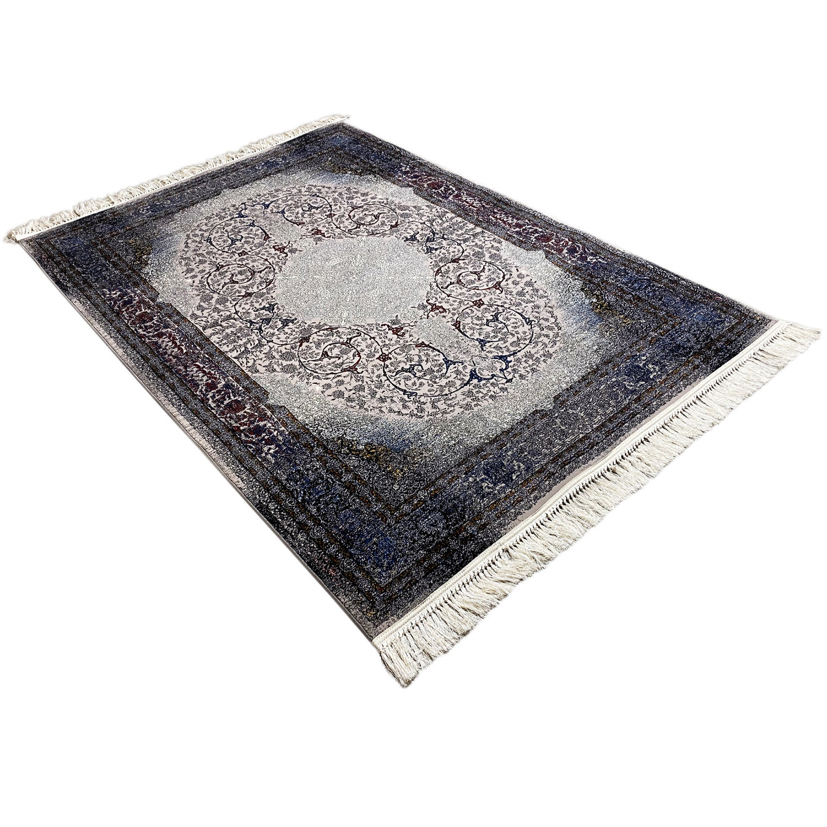 Rug Sofia 160x230 cm, viewed diagonally from above; medallion, dark blue border, fringes