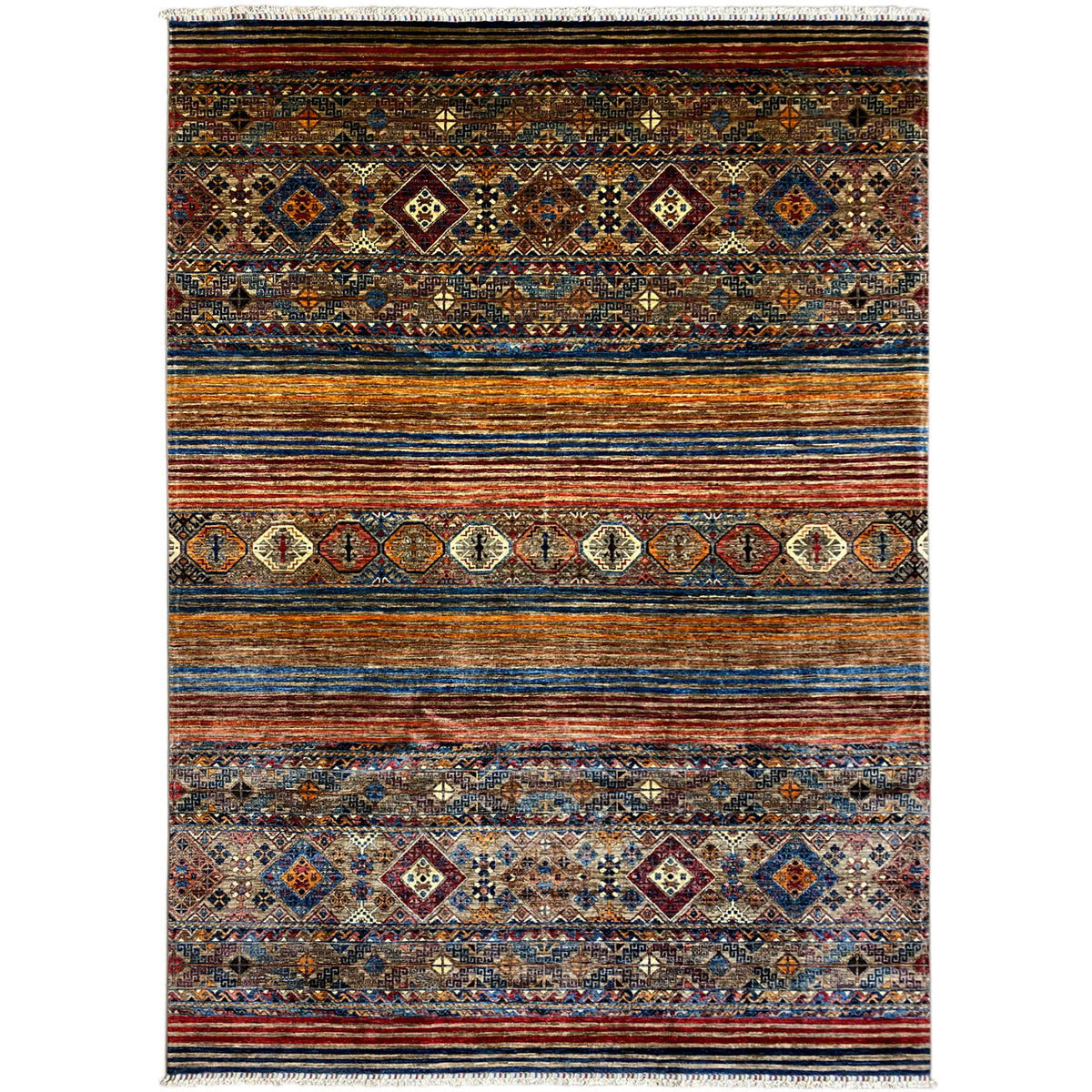 Colorful rectangular rug with a multicolored pattern, striped border, and fringes.