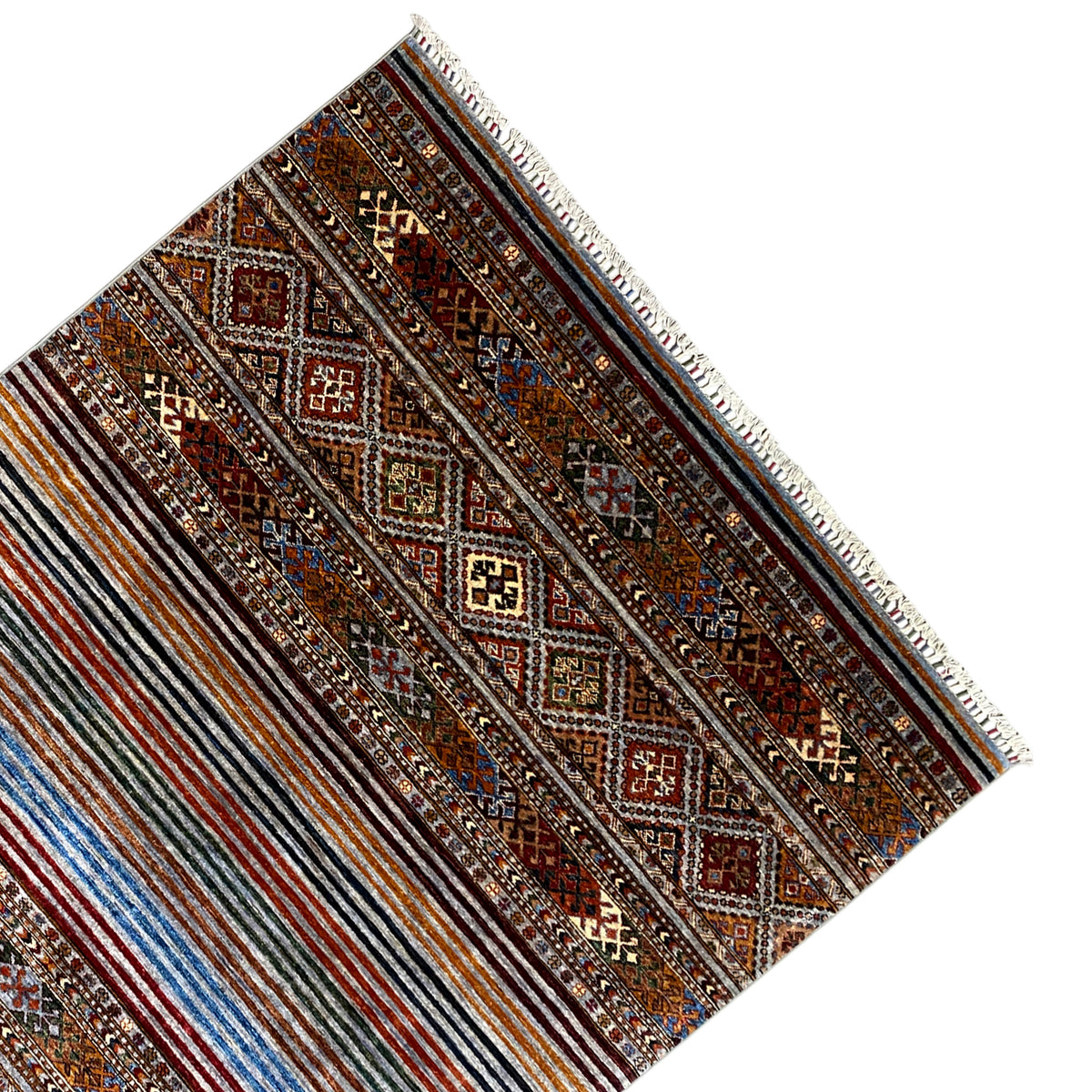 Colorful Khorjin rug at an angle, border with diamond panels and light-colored fringe