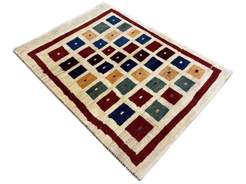 Gabbeh rug with diamond and tile pattern, beige with dark blue and red