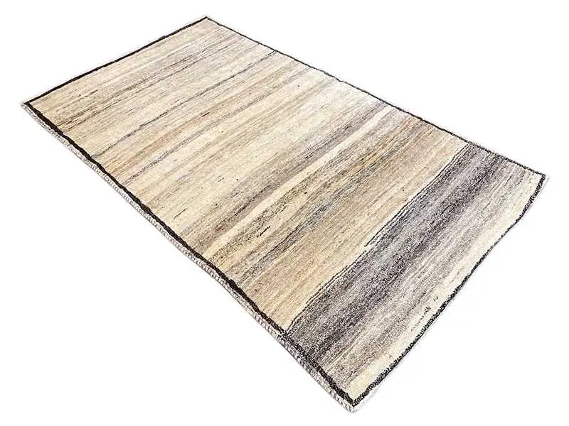 Beige gabbeh rug with gray stripes, diagonal view, rectangular