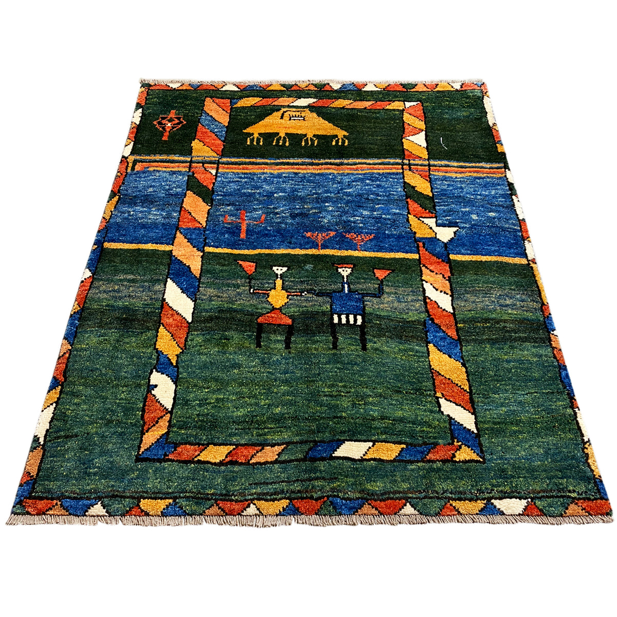 Gabbeh rug in blue, green and orange with a central medallion and border
