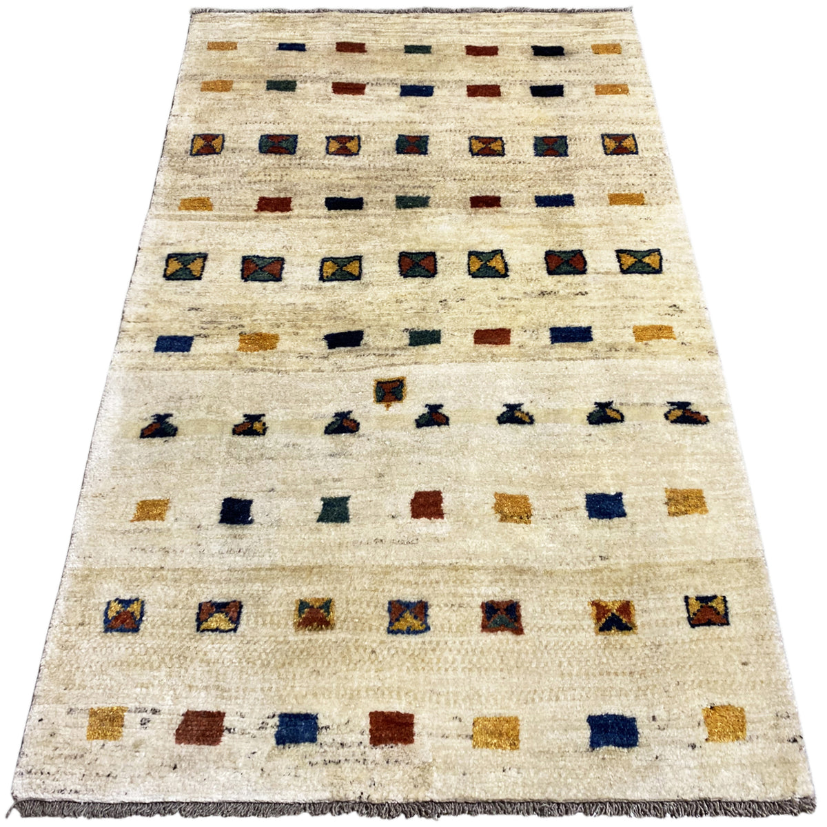Gabbeh rug, diagonal: beige pile with geometric rows in blue, red, and ochre
