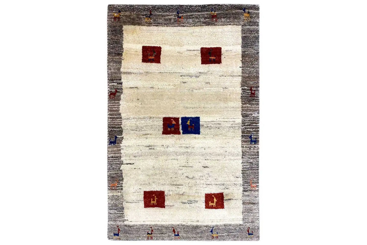 Gabbeh rug with a light background, gray border, and red/blue square motifs