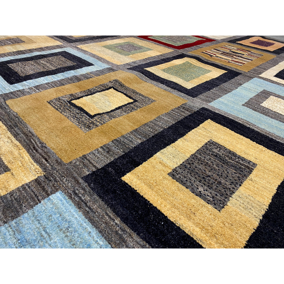 Close-up: carpet surface with golden-yellow and black square patterns