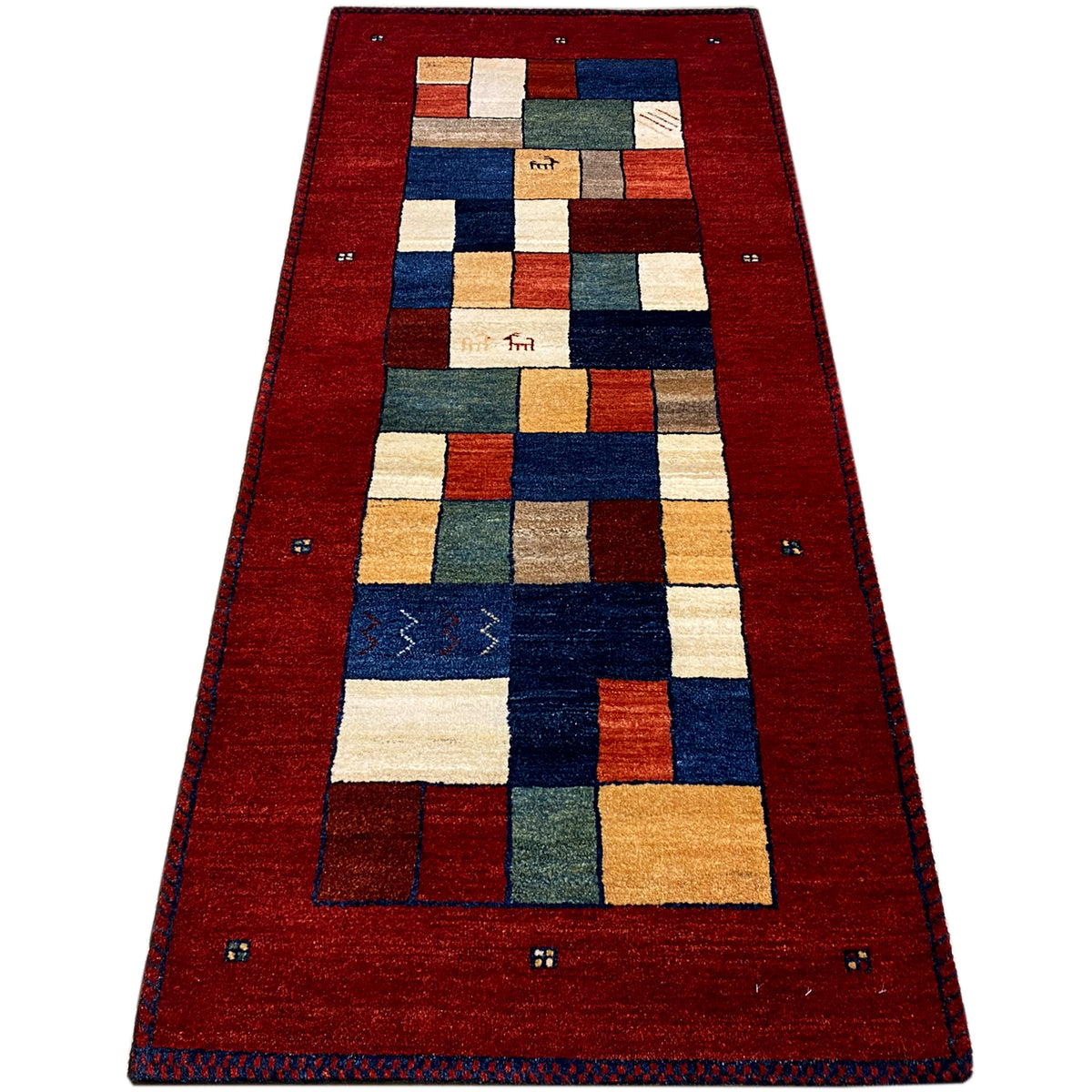 Wide red Gabbeh runner rug with a pattern of square color blocks