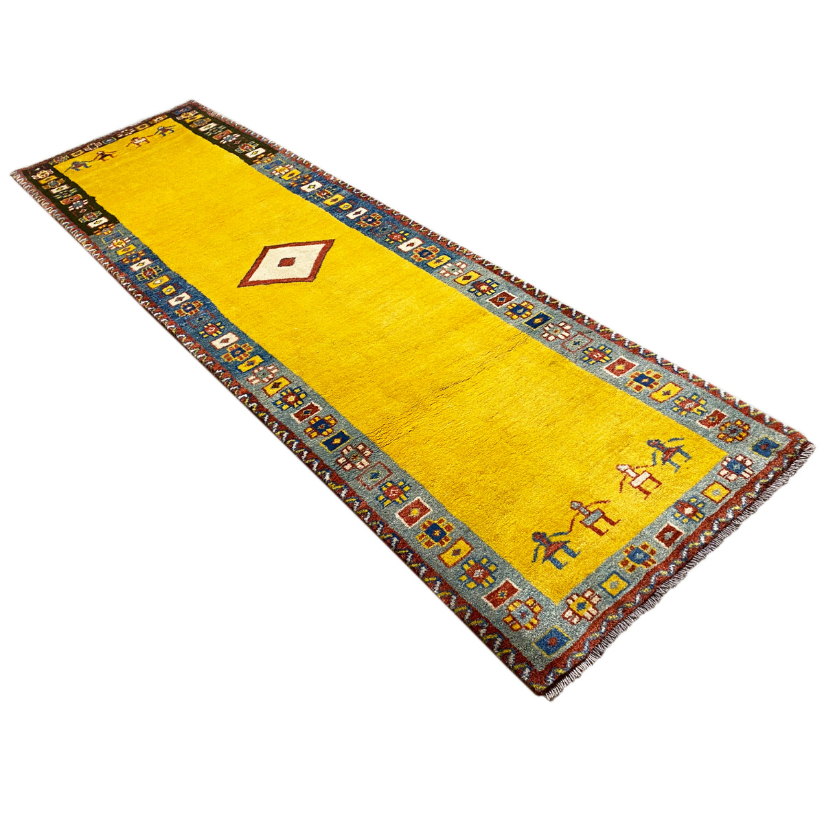 Gabbeh runner in a shade of yellow with a decorative border and multicolored symbols along the edge