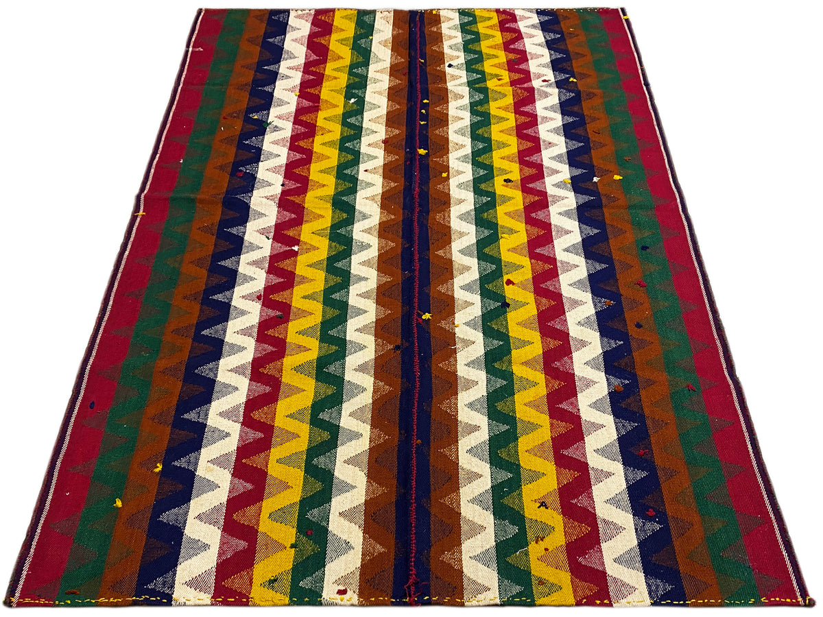 Jajim rug with a triangular/chevron stripe design, brightly patterned, with a finished border