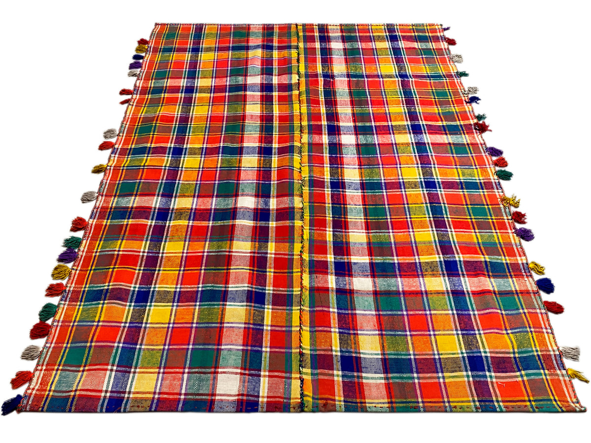Jajim rug with a checkered pattern, spread out with fringes on the sides