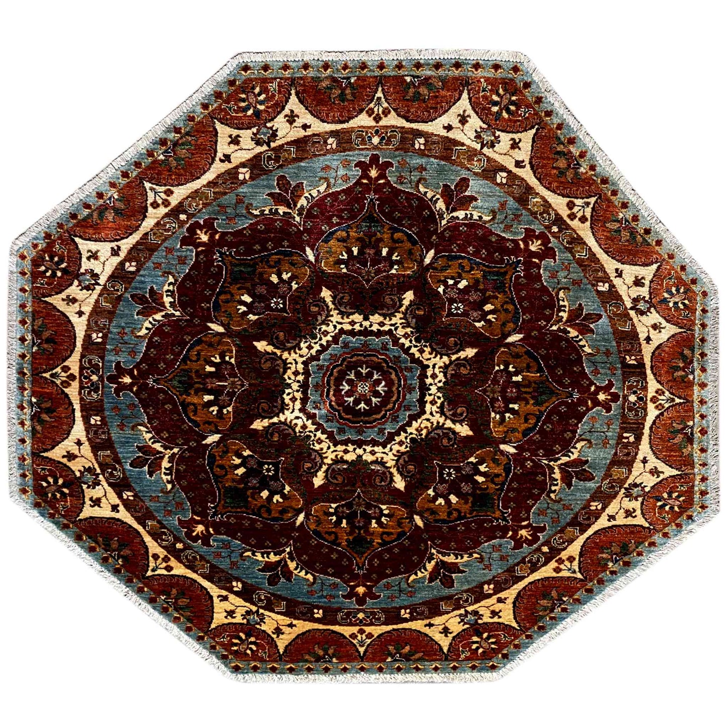 Octagonal rug with an ornamental pattern in blue, red, and beige, featuring a central medallion.