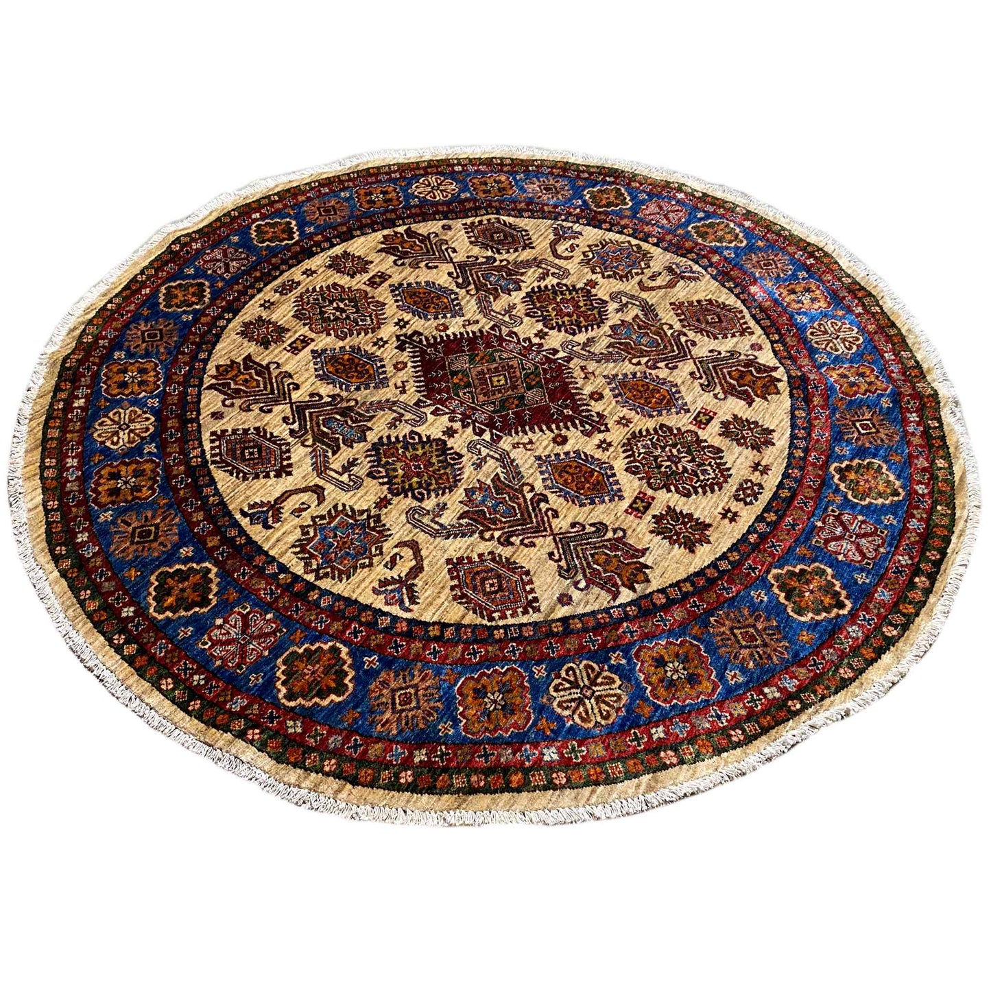 Round rug with a light-colored base, blue border, and burgundy patterned ornaments
