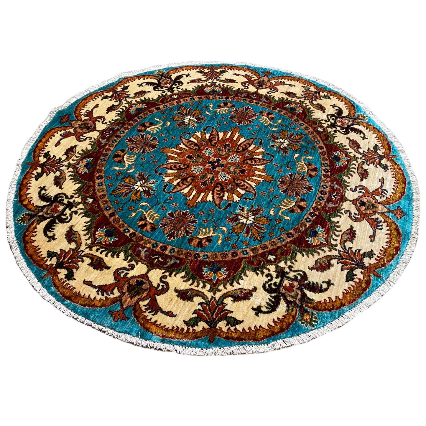 Round Baroque rug with a turquoise central area, brown patterns, and a beige border.