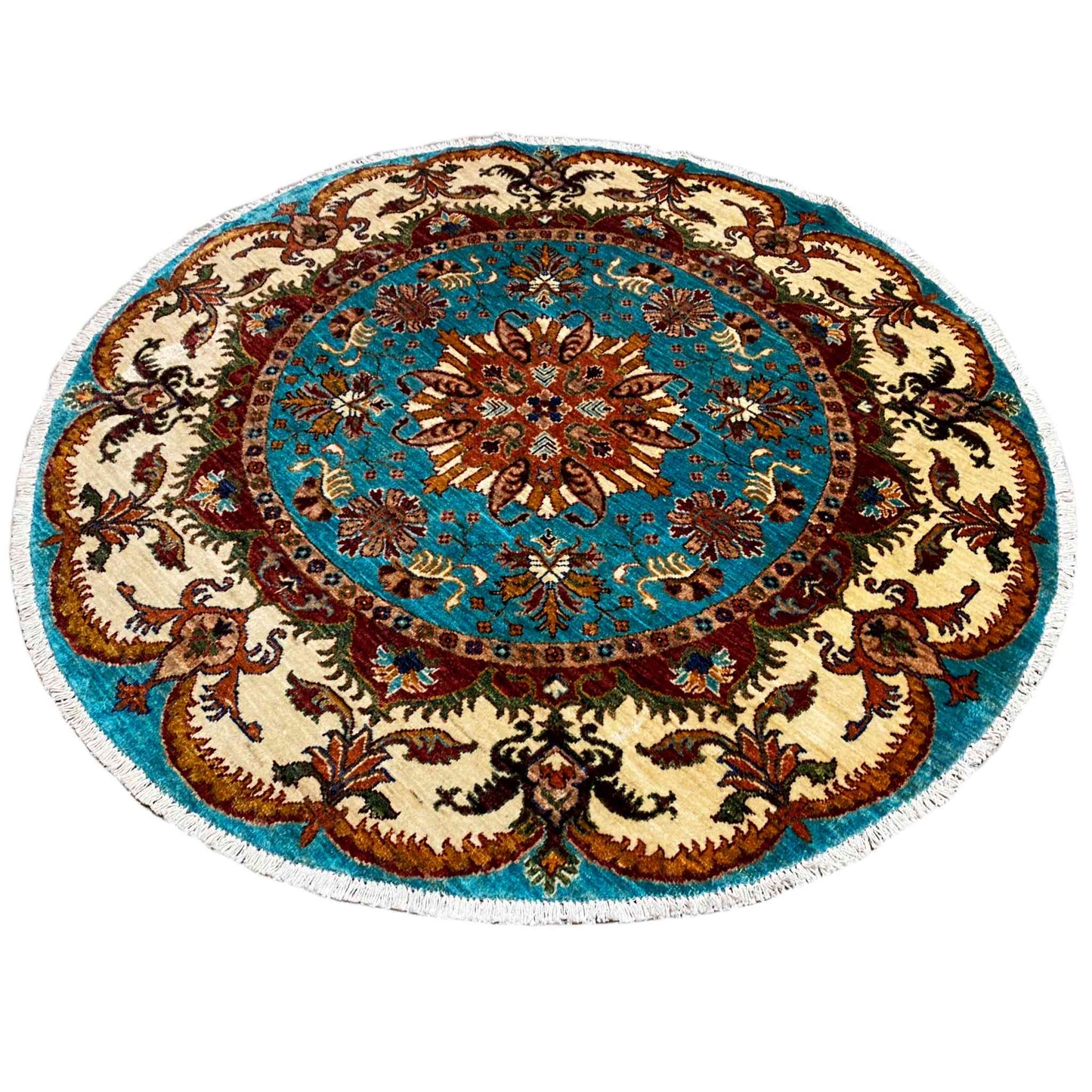 Round rug with a turquoise central area, dark brown pattern, and beige Baroque embellishments.