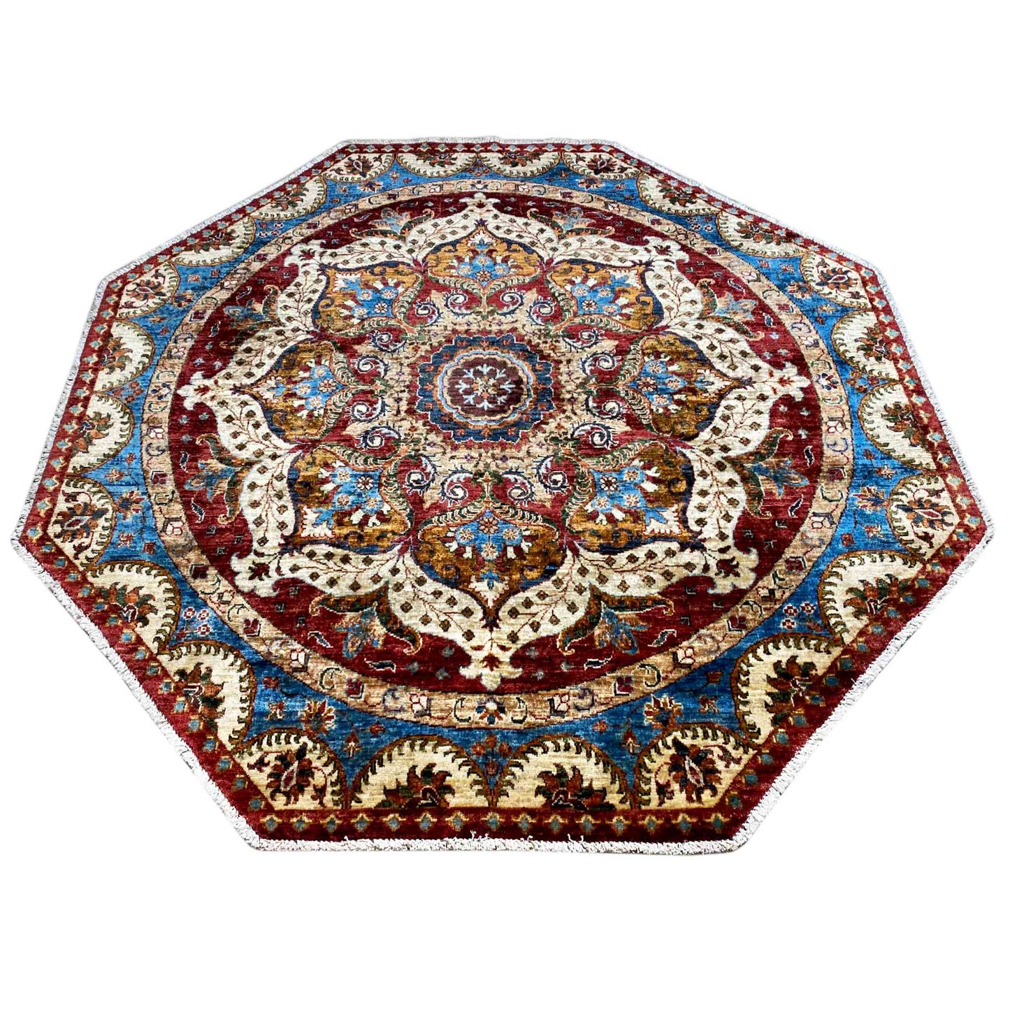 Octagonal rug with a central medallion, floral ornaments, and a wide border pattern