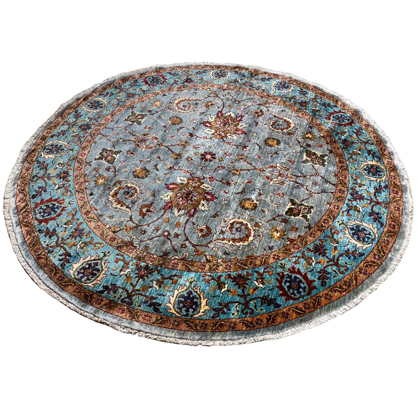 Round rug with a light blue central medallion, colorful floral motifs and decorative border