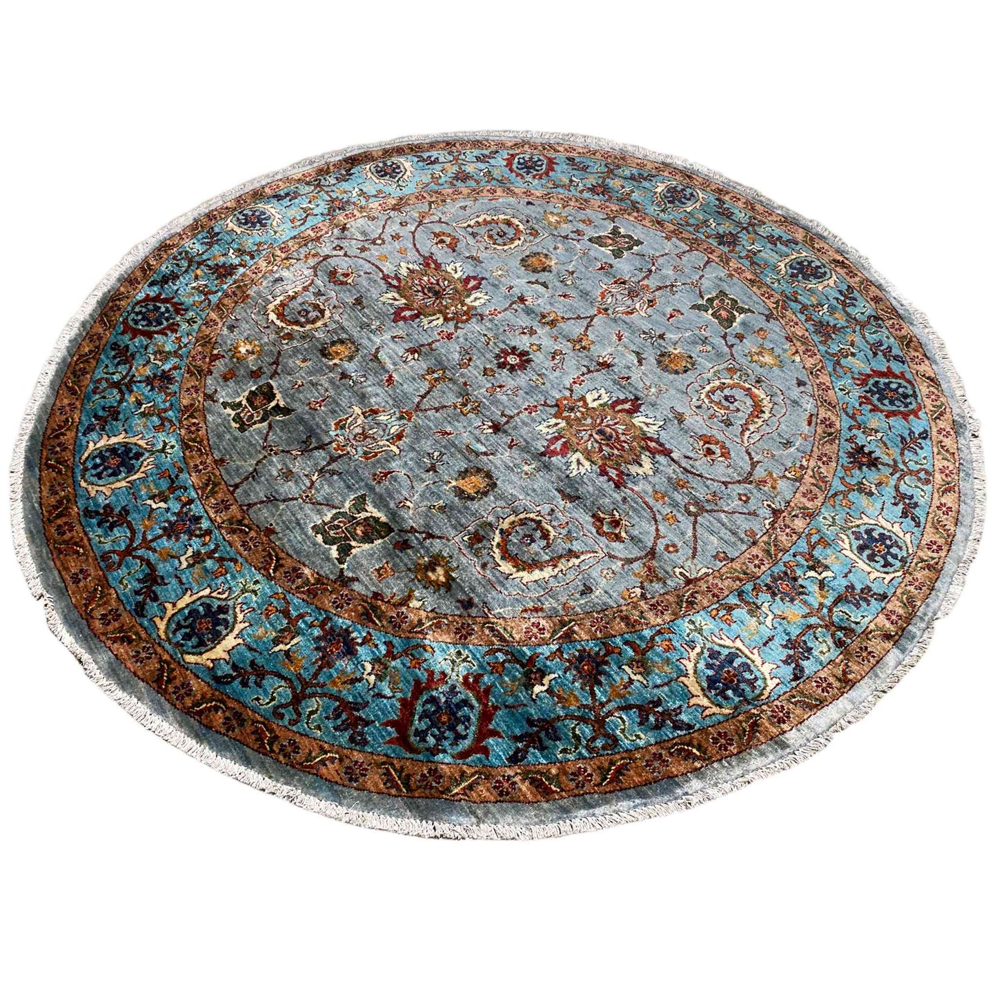 Round rug with a gray-blue background, red and gold ornaments, and a turquoise border