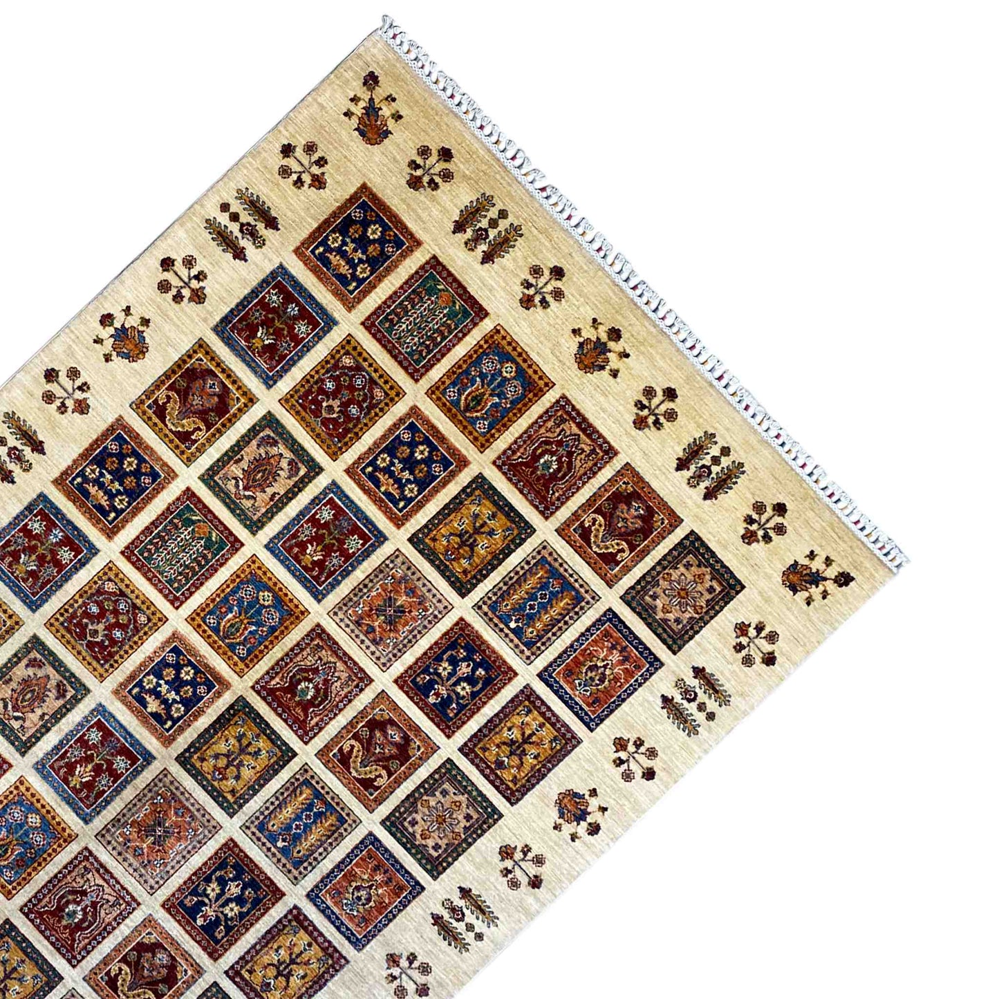 Beige rug with diagonal diamonds, colorful floral ornaments, and decorative fringes