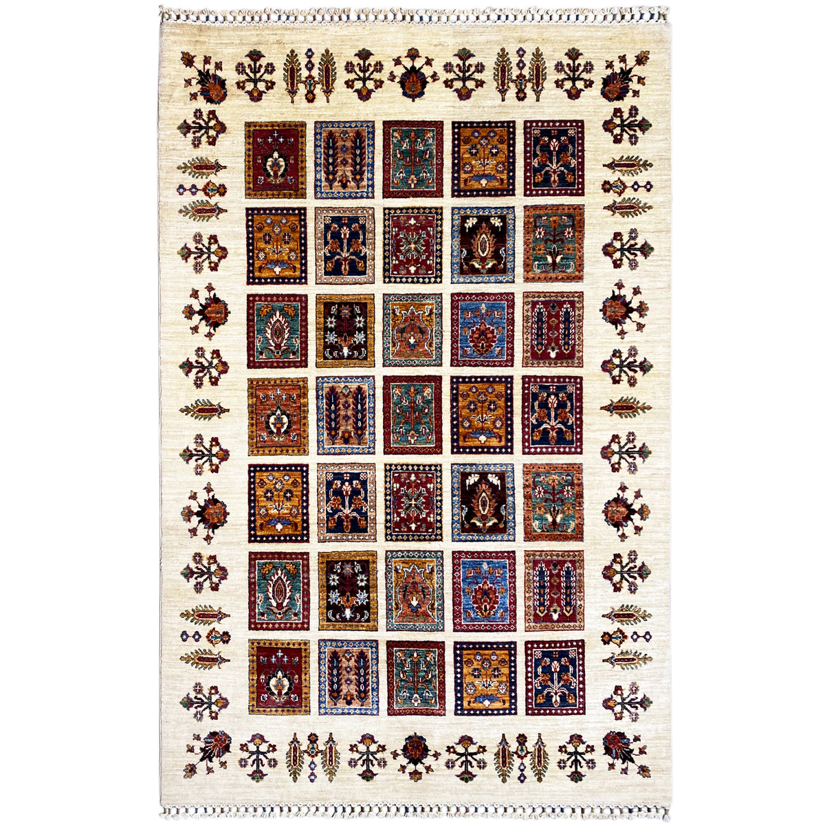 Hand-knotted Khorjin rug with square patchwork and a multicolored ornamental pattern.