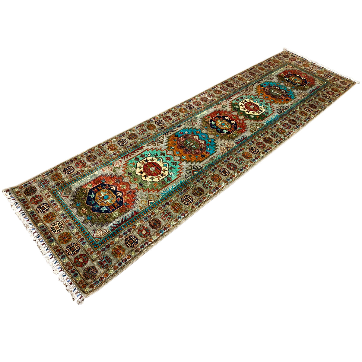 Khorjin runner with a geometric pattern, multicolored inner sections, and tassels