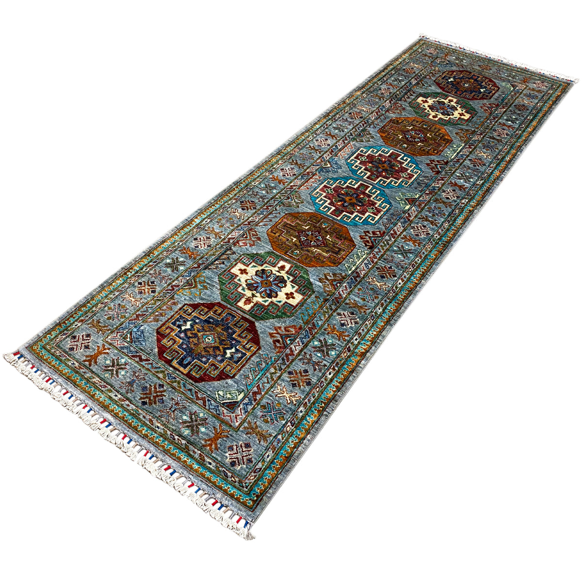 Hand-knotted light blue Khorjin runner with diamond motifs and a surrounding border