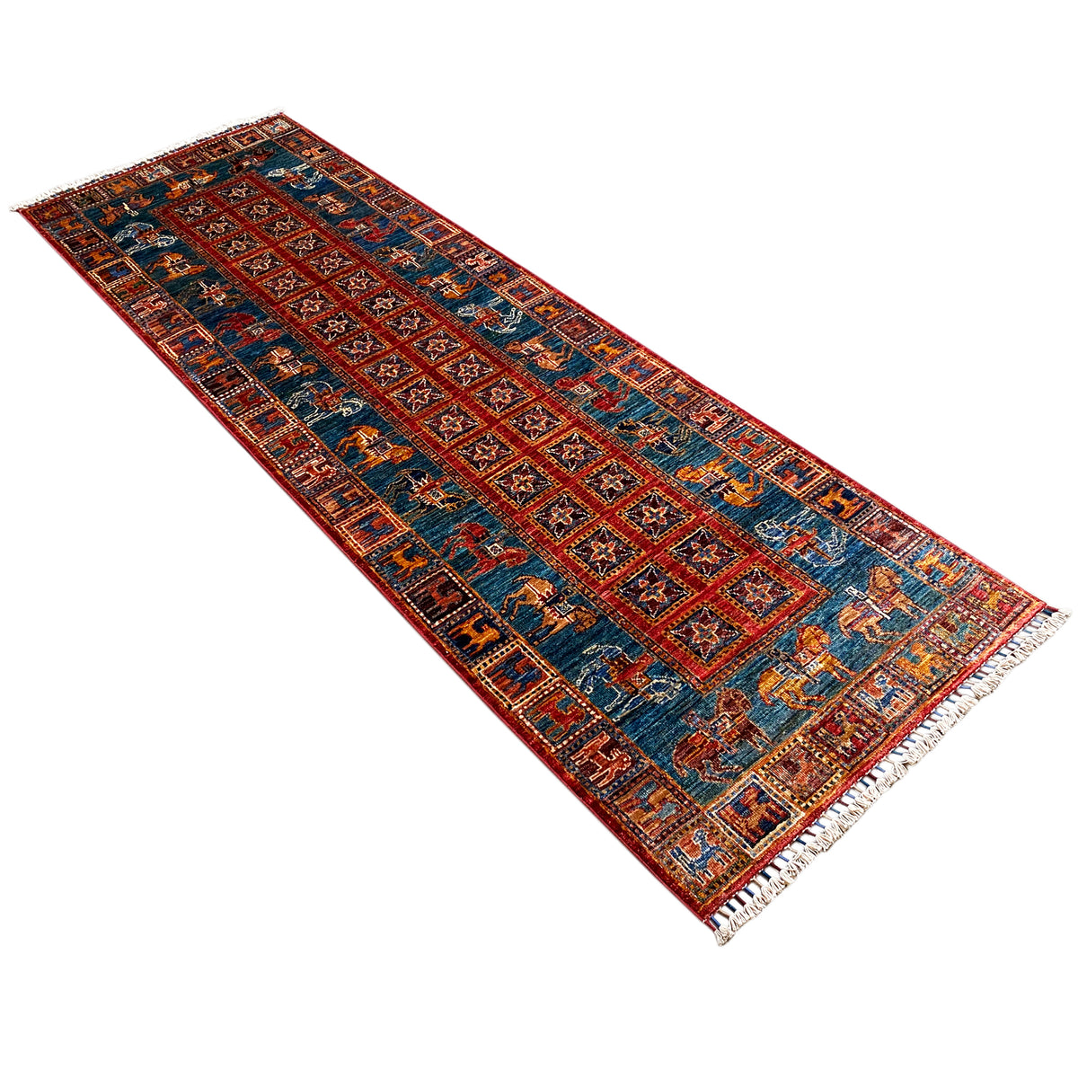 Hand-knotted Khorjin runner in dark blue with red fields and borders, rectangular.