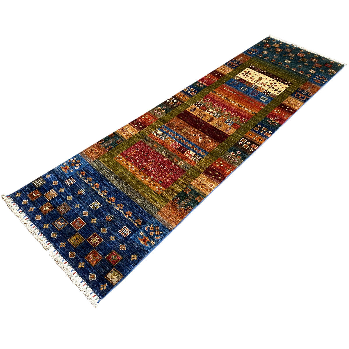 Runner rug with a blue border, colorful rectangles and multicolored central areas; short fringes