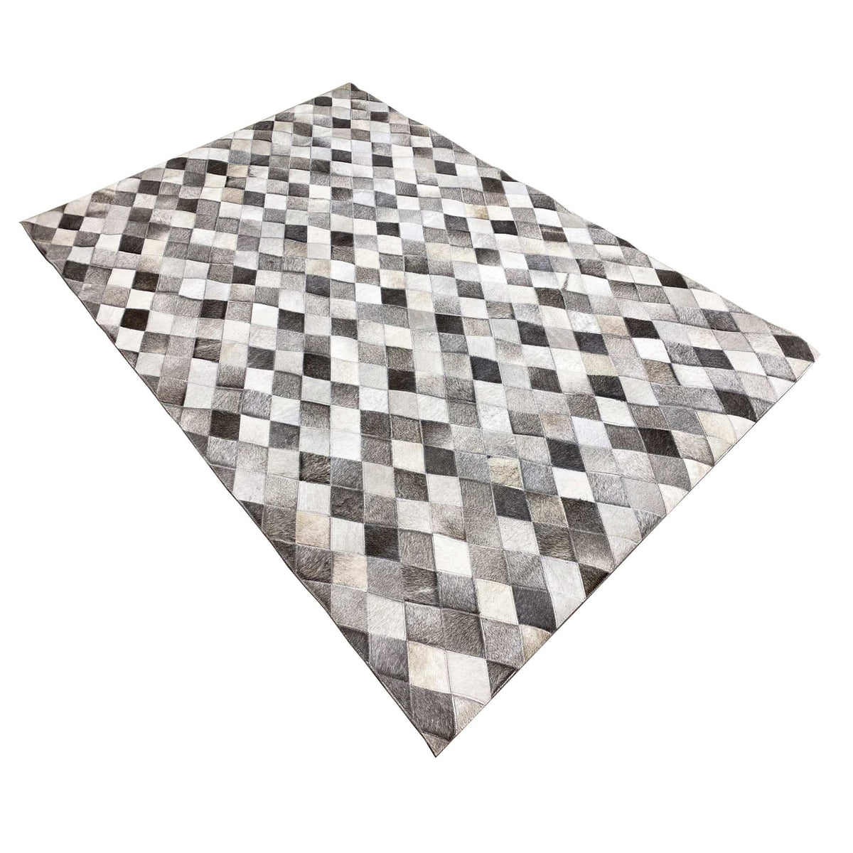 Calfskin rug with a diamond pattern in black, gray, and white