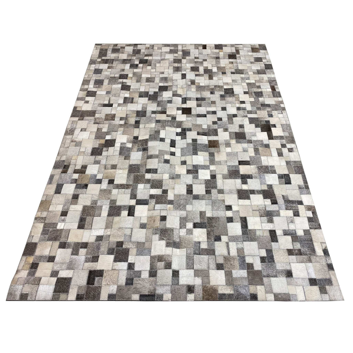 Rectangular calfskin rug with a large-scale tile pattern in gray, cream, and dark brown