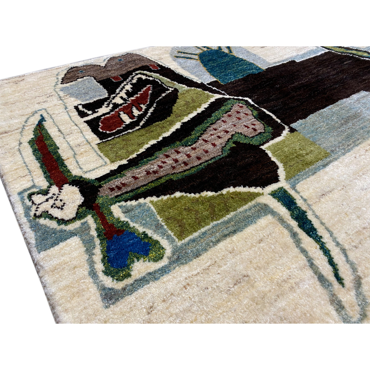 Close-up of the Gabbeh rug: multicolored figurative and line pattern on a beige background