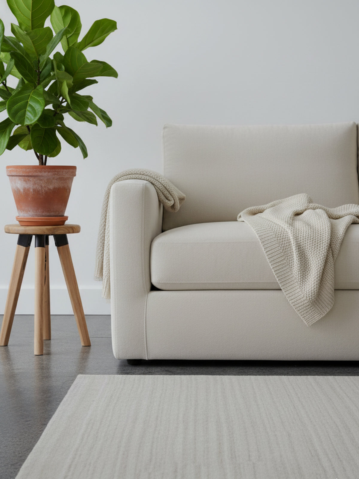 Natural gabbeh rug, laid out over a large area, with a uniform light line pattern