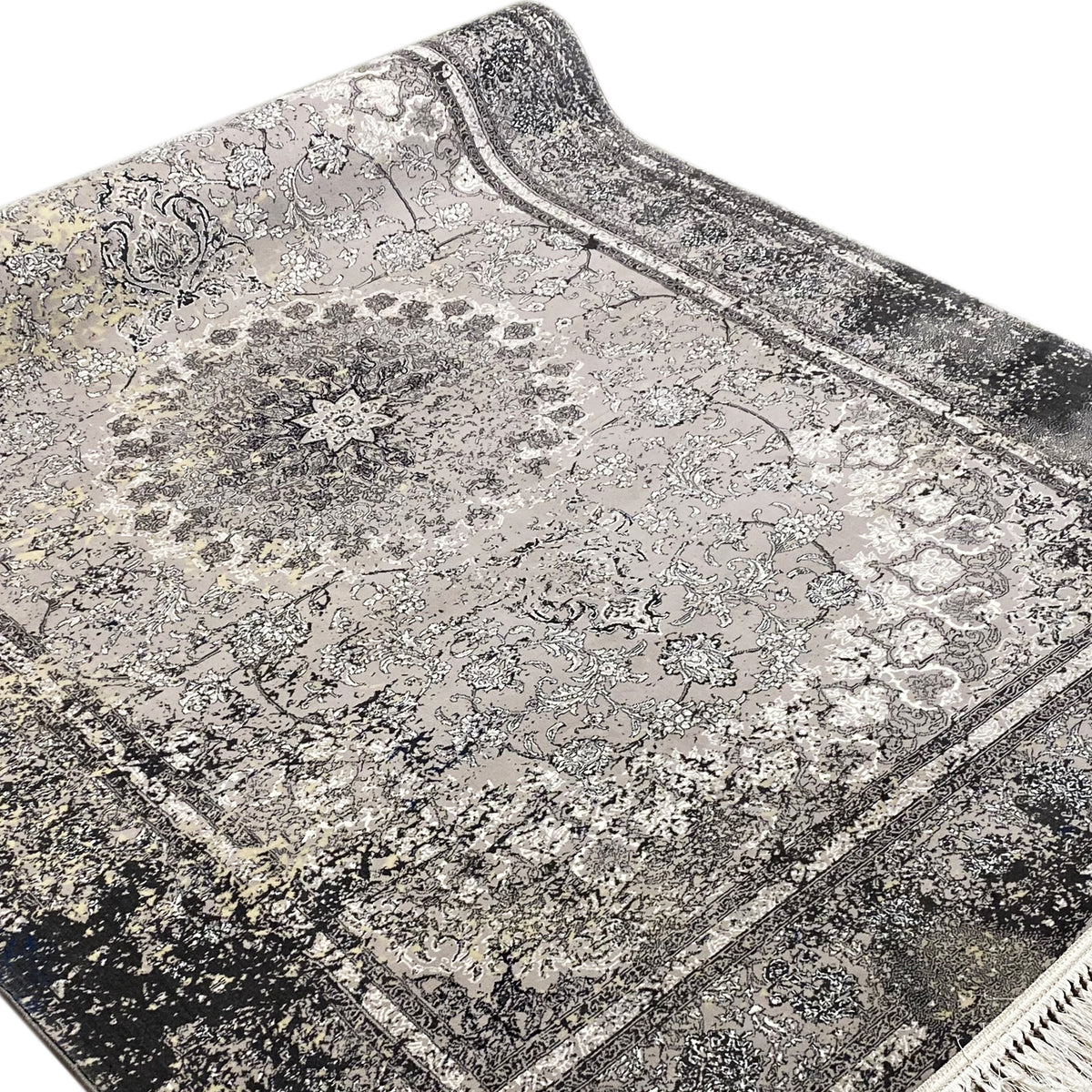 Gray mottled vintage rug with delicate ornamental details and a wide border frame