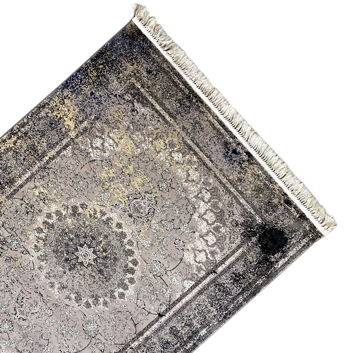 Vintage rug in gray, shown at a diagonal angle with a border and white fringe