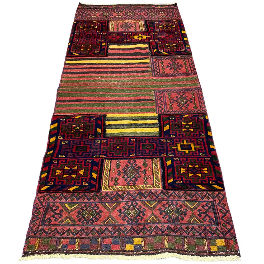 Bakhtiari kilim rug, wide stripes and diamond panels, with fringe along the bottom edge