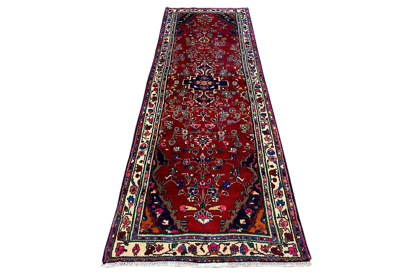Hamadan runner on a stand, red with an ornamental carpet pattern and a wide multicolored border