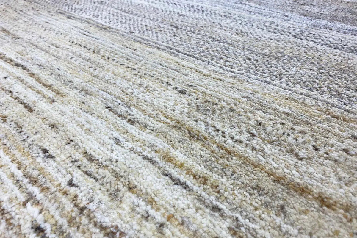 Gabbeh rug with a light beige and gray pattern, fine woven texture in the pile