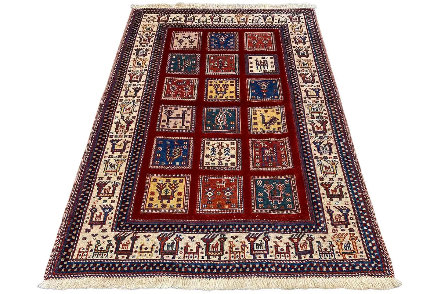 Rug 149x104 cm with a red central field, blue and beige patterned squares