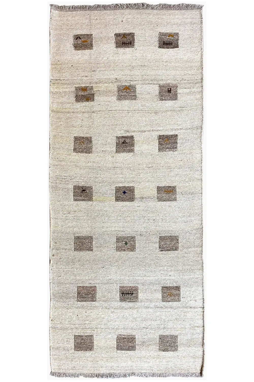 Kilim runner with a beige background and rectangular square patterns in brown, fringed edge
