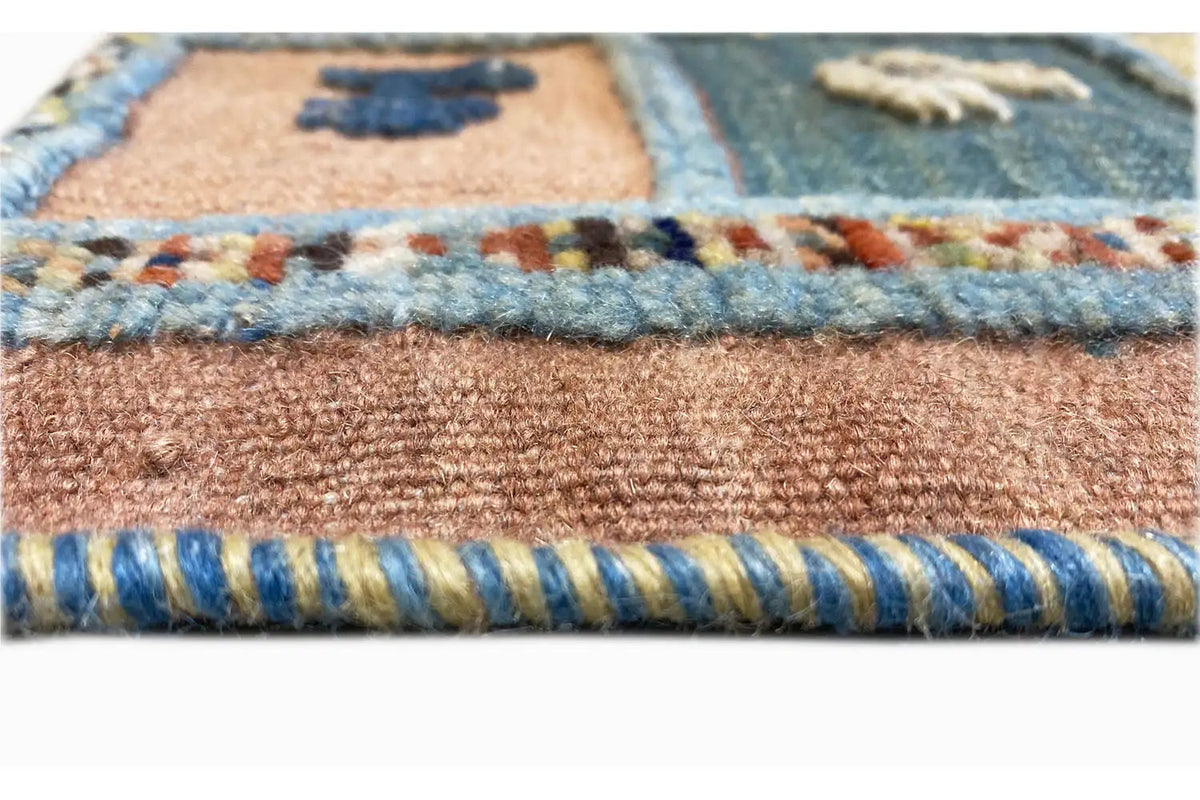 Kilim rug detail of the woven edge with multicolored edging and brown pile