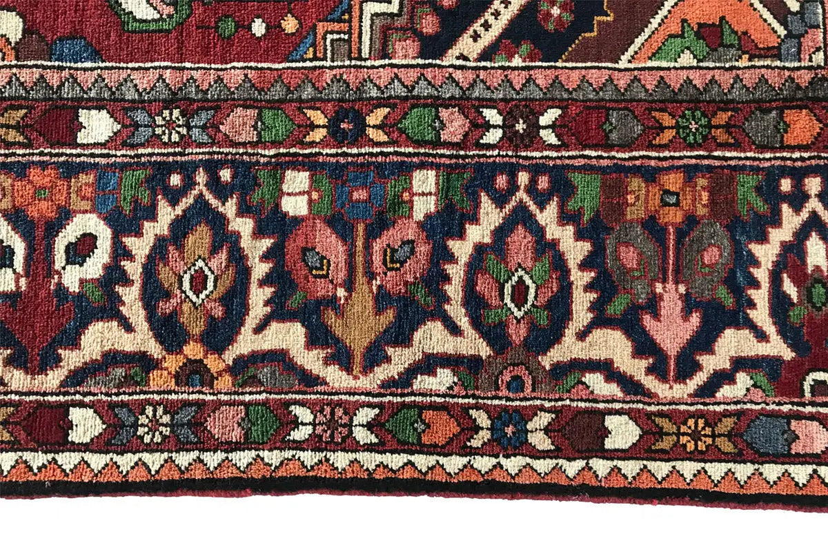 Carpet border with blue-red ornaments, zigzag and diamond rows