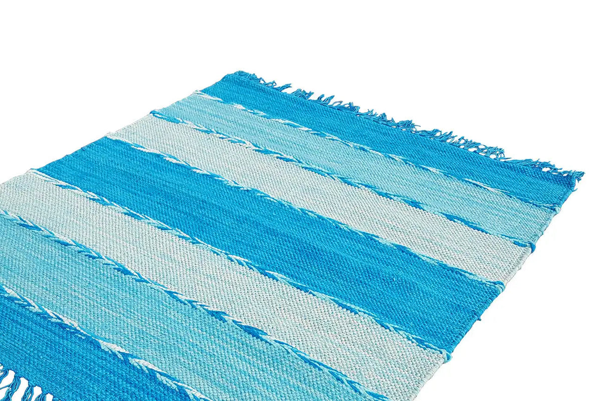 Kelim dhurrie rug in detail, multiple blue and white stripes, edged with fringes
