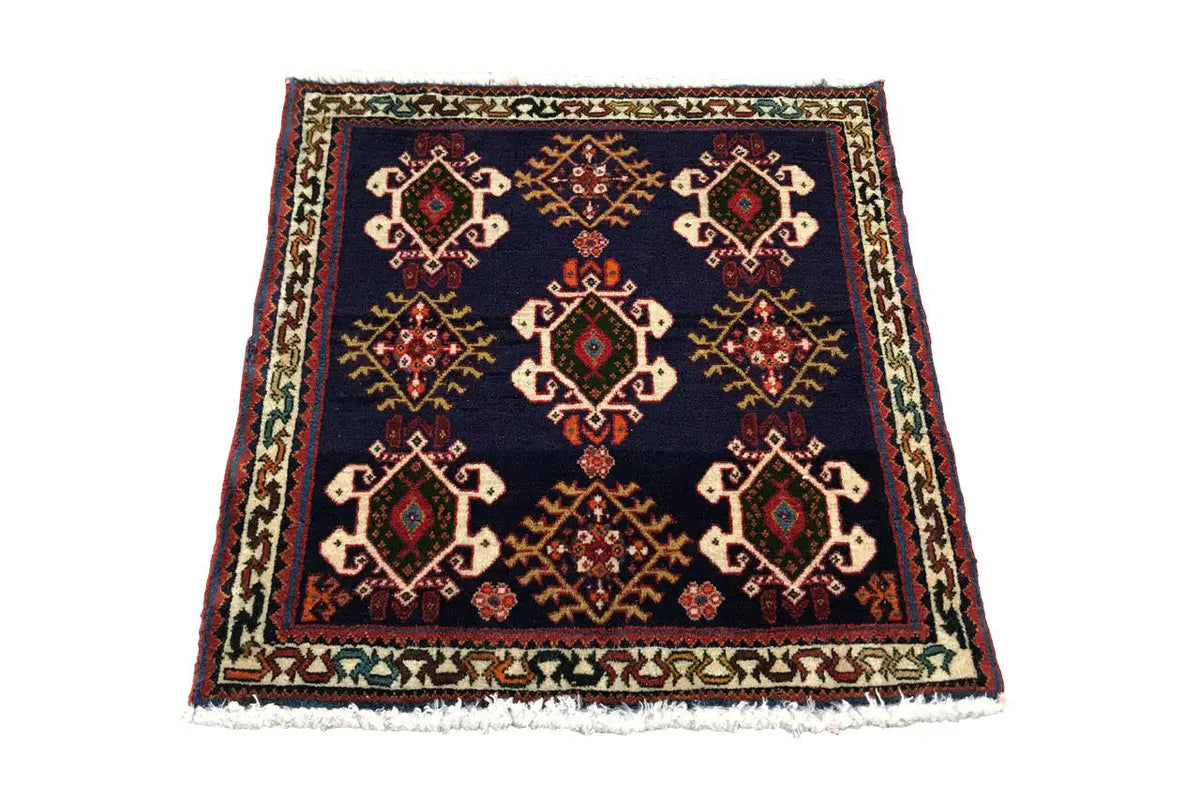 Rug 61x60 cm with a dark blue background and multicolored ornamental pattern