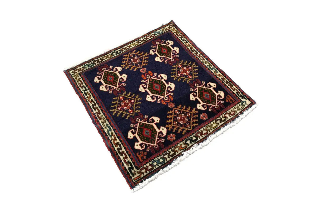 Rug 61x60 cm, diagonal: dark blue with decorative ornaments and a colorful border