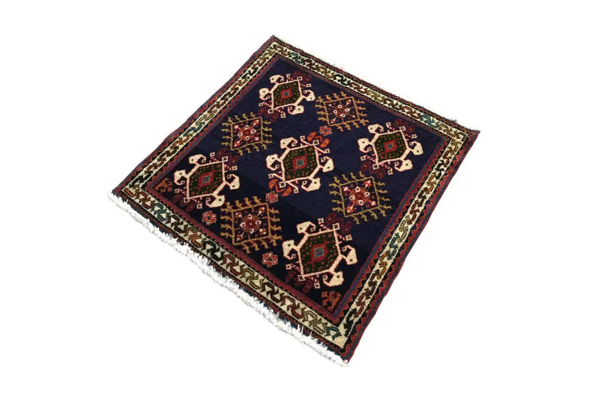 Rug 61x60 cm, dark blue with central cross ornaments and a colorful border