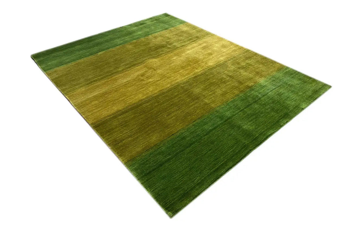 Gabbeh rug with green-yellow areas and a calm pattern of horizontal stripes