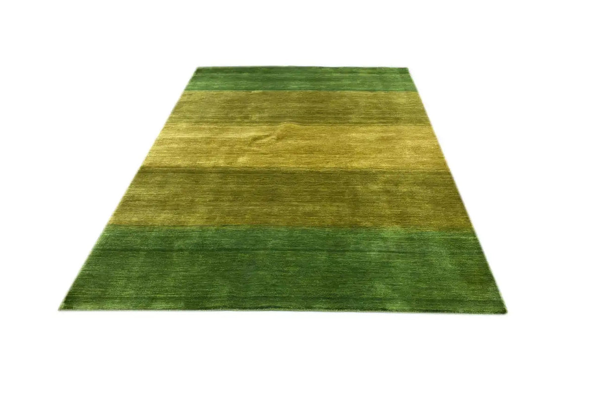 Green Gabbeh rug with wide, horizontal bands of color and a fine pile