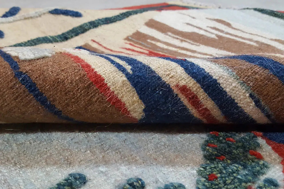 Kilim-Qashqai rug close-up: colorful woven stripes, dense pile at the edge