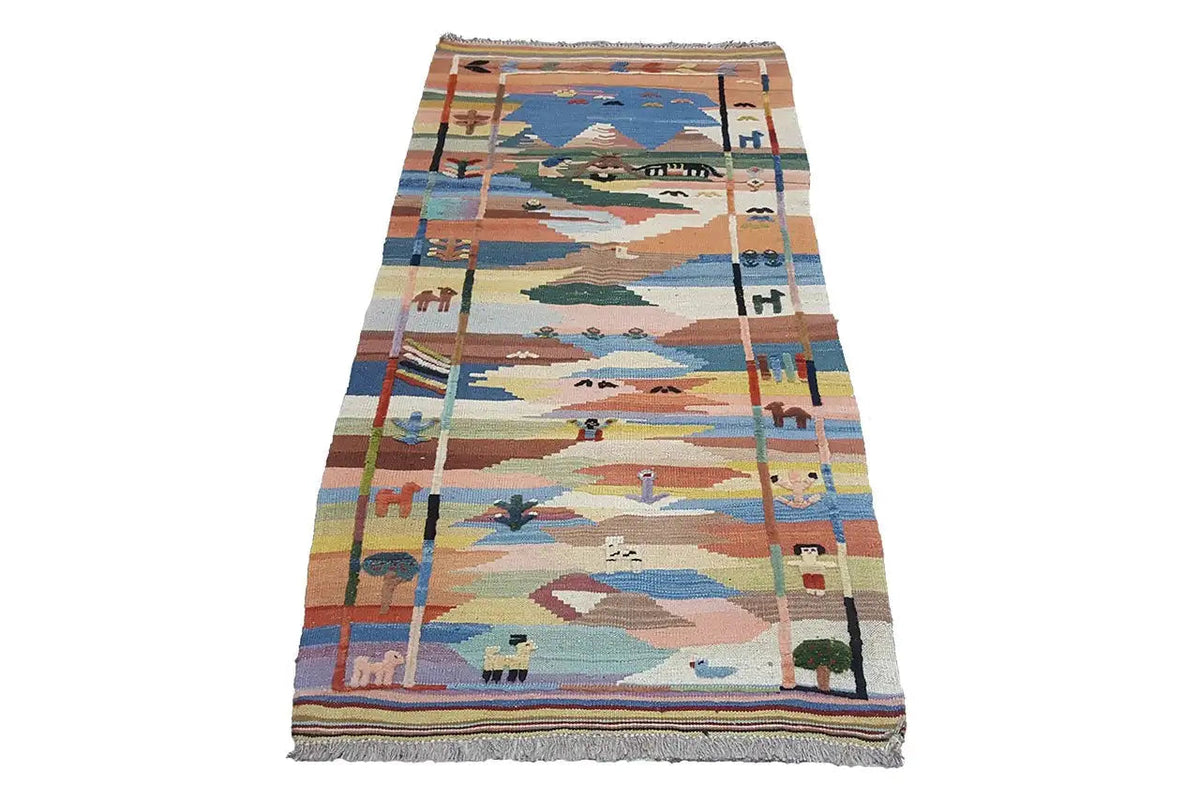 Woven rug with a landscape motif in blue, beige, orange, and green, with fringes