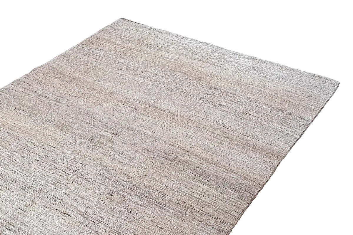 Gabbeh natural rug: elongated close-up, light beige-brown surface texture