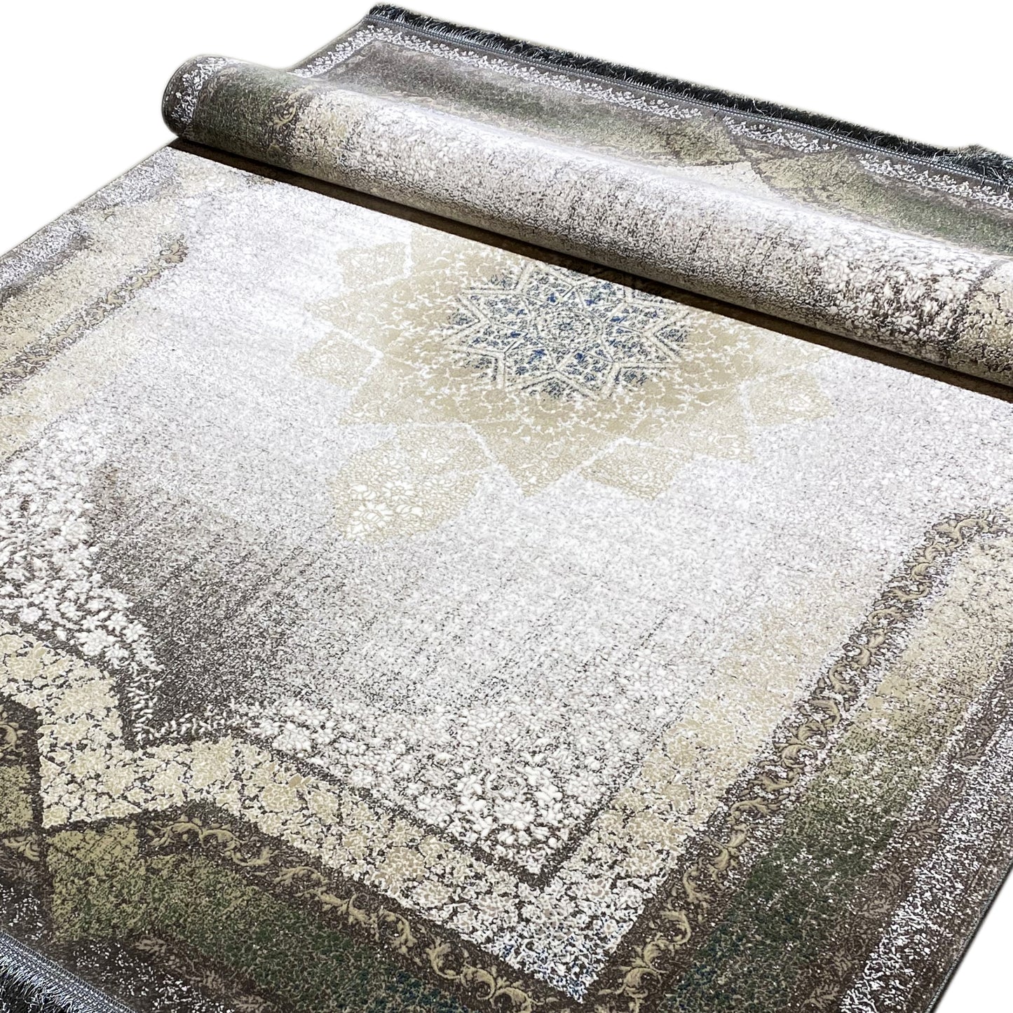 Rauchgrüner Teppich mit sternförmigem Medaillon für eine moderne Einrichtung.