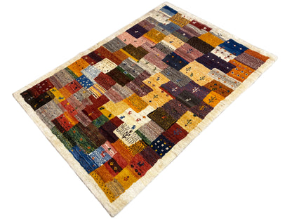 Gabbeh Luri-Teppich 145x105 cm diagonal: gemusterte Patchworkfelder in Rot, Blau und Gelb